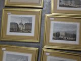 four framed pictures of buildings on the wall of a room