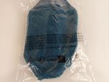 a blue face mask in a plastic bag on a table