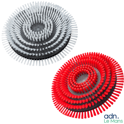 two red and white brushes sitting on top of each other