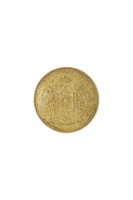 une pièce d'or sur fond blanc