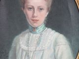 portrait of a woman in a white dress in a gold frame