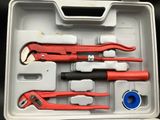 a tool kit in a plastic case on a table