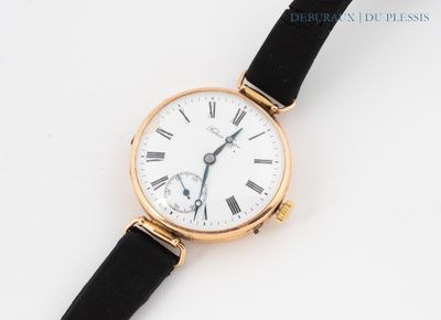 an image of a close up of a wrist watch with roman numerals