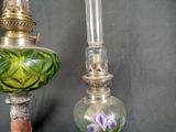 two lamps that are sitting next to each other on a table