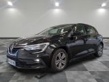 a black car is parked on a checkered floor in a garage