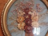 a picture of a picture of a bouquet of flowers in a picture frame