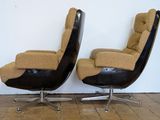pair of mid - century lounge chairs in black leather and tan upholstered upholstered upholstered upholstered upholstered upholstered uphol