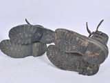 a pair of shoes that have been left on the ground
