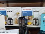 a blender sitting on a counter next to a box of blenders