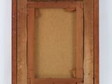an old picture frame with a brown paper backing and a brown paper backing