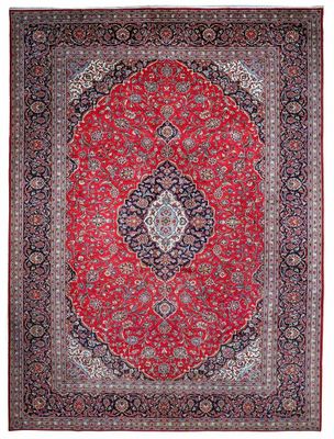un tapis rouge orné d'un médaillon