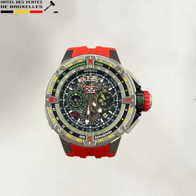 a red and black watch on a white background