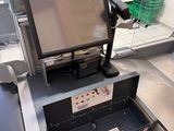 an image of a cash register machine with a monitor