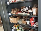 many boxes and boxes on the shelves in the room