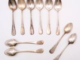 a lot of spoons and spoon spoons on the table