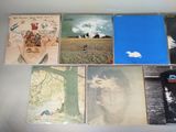 a lot of records on the table together