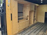 a truck with a bed in the back of it
