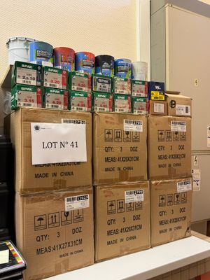 boxes of food are stacked on top of a counter in a kitchen