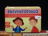 a tin box with a picture of a boy and a girl on it