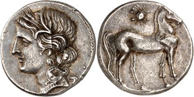 a silver coin with an image of a woman and a horse on it