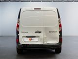 a white van that is parked in a room