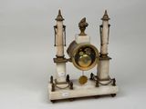 a clock that is sitting on top of a table