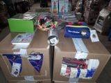 two boxes that have various items on top of them