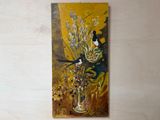 a painting on the wall of a room with a vase of flowers