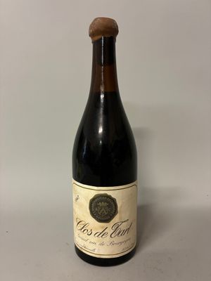 an image of a bottle of wine sitting on top of a table