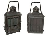 pair of antique copper lanterns on white background