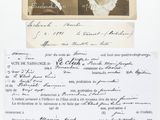 an old photograph of two women in black and white with a note attached to them