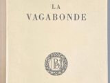 an old book with a black and white logo on it