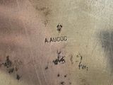 an image of a close up of a silver plate