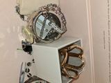 a picture of a jewelry display in a white box