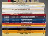 a stack of books sitting on top of each other on a table
