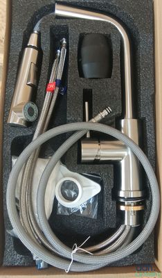 a box that has a hose and other items in it