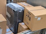 many boxes that are sitting on a carton