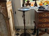 an image of a room with a table and a lamp