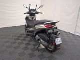 a motorcycle that is parked in a room