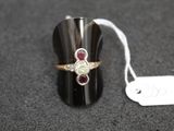 a ring that is sitting on a table with a price tag
