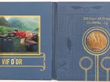 an image of a blue book with a picture of a man on a boat