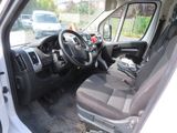a view of the inside of a van from the driver ' s seat