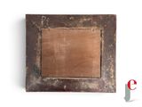 a picture of an old picture frame on the wall
