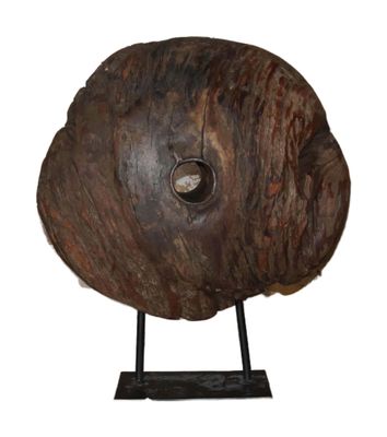 an image of a wooden sculpture on a stand