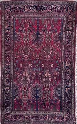 tapis persan ancien à motif floral sur fond rouge