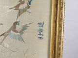 a picture of a picture of birds flying in the air