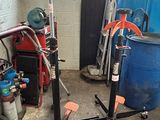 a picture of a garage with a lot of tools and equipment