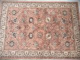 an antique persian rug on the floor in a room