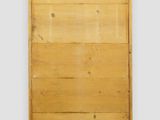 an image of a wooden paneled wall hanging on a wall