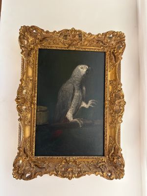 a painting of a parrot hanging on a wall